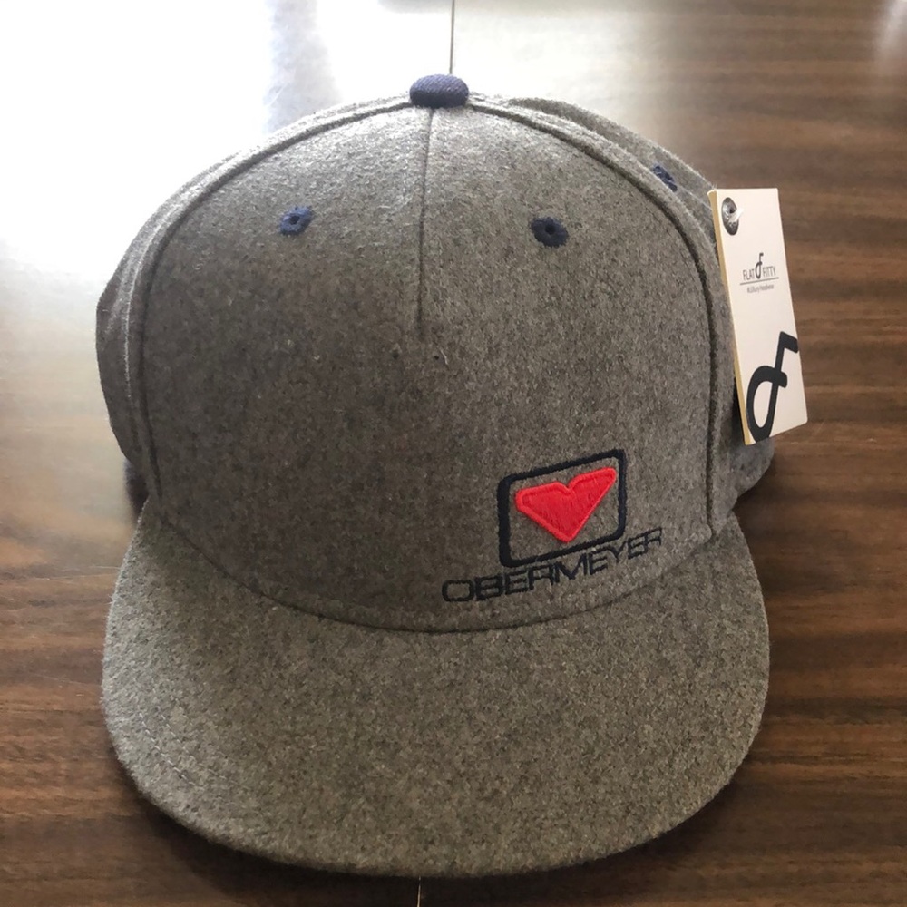 BRAND NEW WITH TAG. GREY OBERMEYER SKI HAT/ASPEN COLORADO